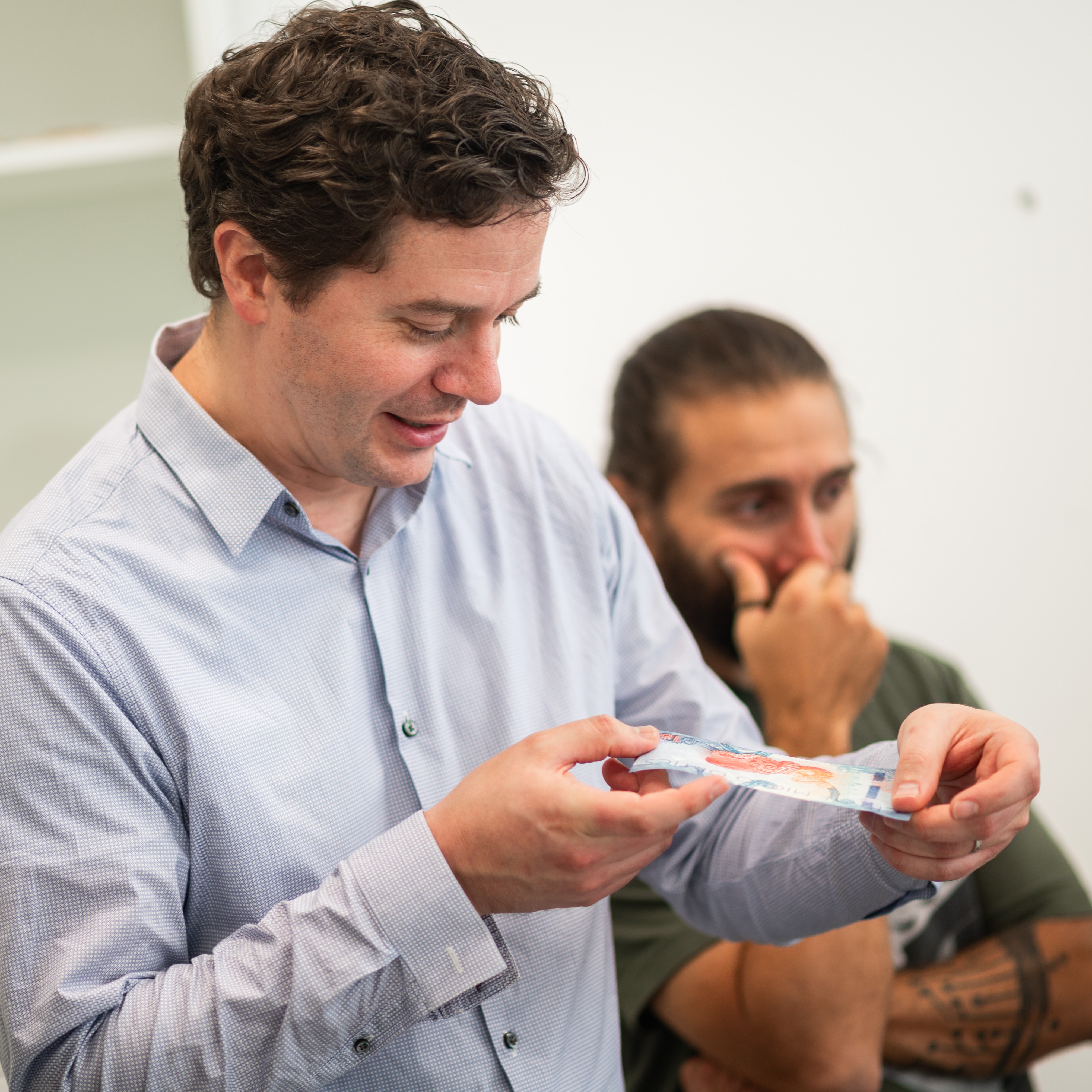 Ben Bleiman inspecting a housenote